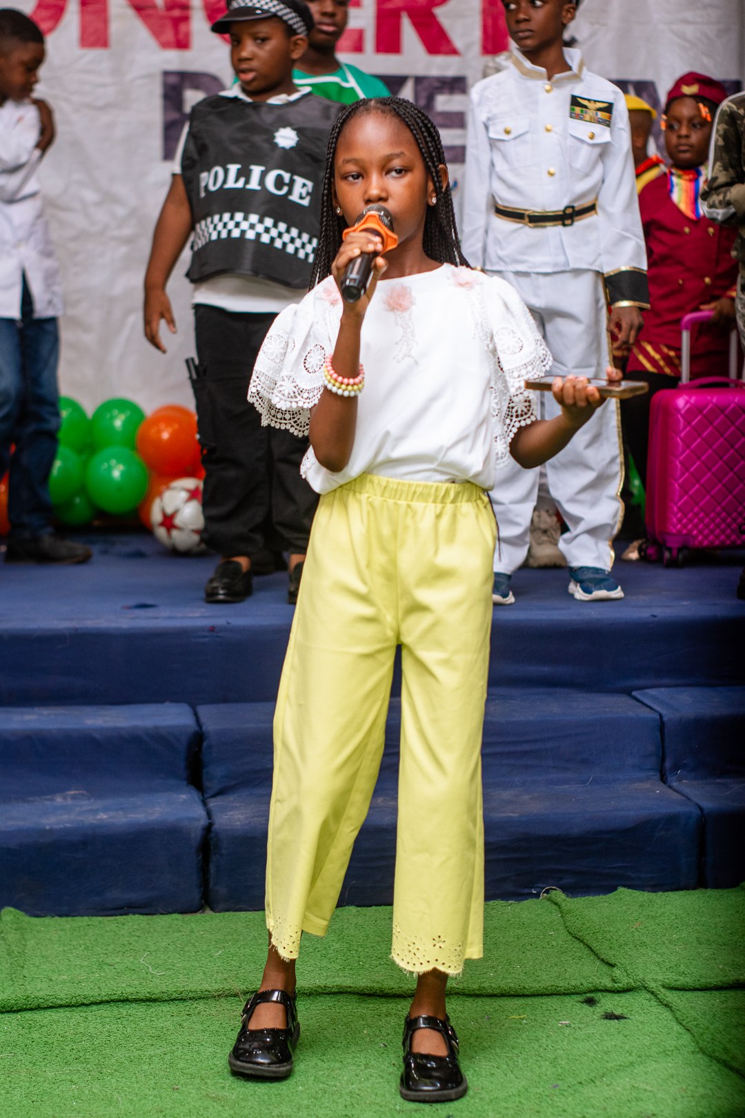 Citacad pupil performing on stage at the school concert