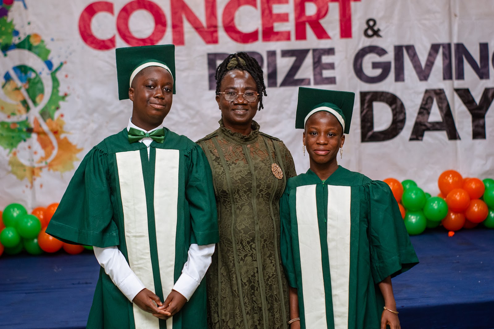 Citacad graduates celebrating with a teacher