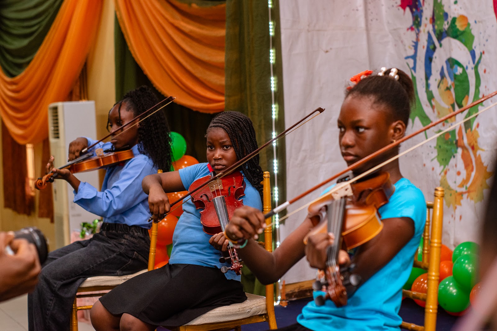 Citacad pupils playing violins together
